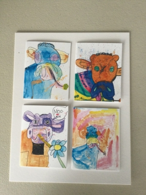 Cow Cards featuring 4 different paintings from artists at Arts in Motion Studio.