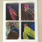 Paintings of roosters digitally printed on cards by artists at Arts in Motion Studio.