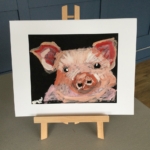 A large digital print of a pig.